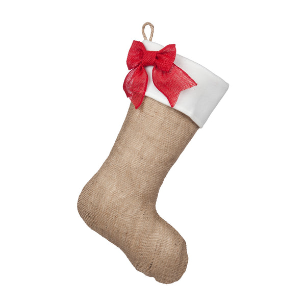 A natural burlap Christmas stocking with a red bow on an ivory fleece cuff, hanging from a braided jute loop. Made by BurlapBabe.