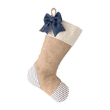 BurlapBabe Christmas stocking featuring natural burlap, blue ticking stripe accents, and a decorative blue burlap bow.