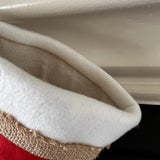 BurlapBabe Christmas stocking featuring an ivory fleece cuff, red burlap ribbon, and natural burlap accents.