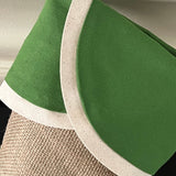 BurlapBabe green ticking and burlap Christmas stocking with off-white muslin trim and braided jute hanging loop