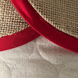 BurlapBabe quilted Christmas stocking featuring a natural burlap scallop cuff with rich red cotton trim