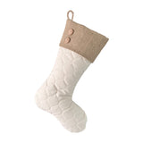 BurlapBabe quilted Christmas stocking in cream fabric with a rustic burlap cuff, wooden buttons, and jute loop.