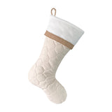 BurlapBabe quilted Christmas stocking in neutral cream fabric with a white cuff and burlap trim for holiday decor