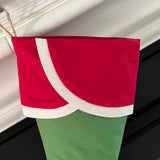 BurlapBabe red and green Christmas stocking with a neutral fabric cuff and braided jute hanging loop