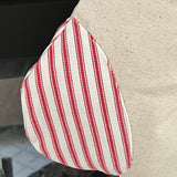 BurlapBabe red and white striped fabric Christmas stocking with neutral tone accents and braided jute hanging loop
