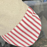 BurlapBabe Christmas stocking featuring a neutral fabric top and a red and white striped fabric accent.
